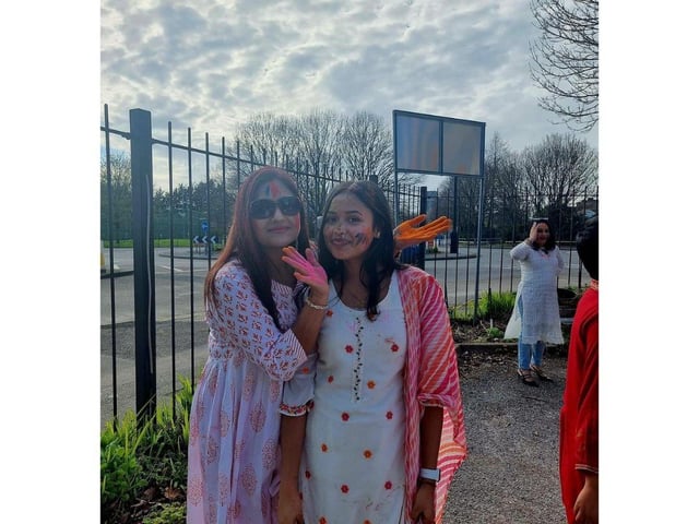 Suman and Pooja Ghosh celebrate at the Festival of Colours. Around 200 people attended the event as the Hindu community came together and welcomed anyone that wished to join them.