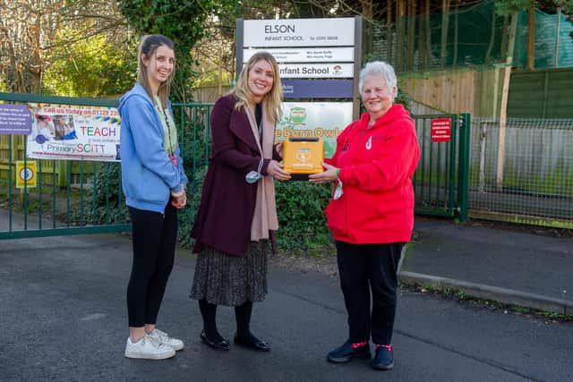 Chloe Wayne-Morris of Elson pre-school, Hayley Page of Elson Infant School with Elizabeth Humphries and a defibrillator. Picture: Habibur Rahman