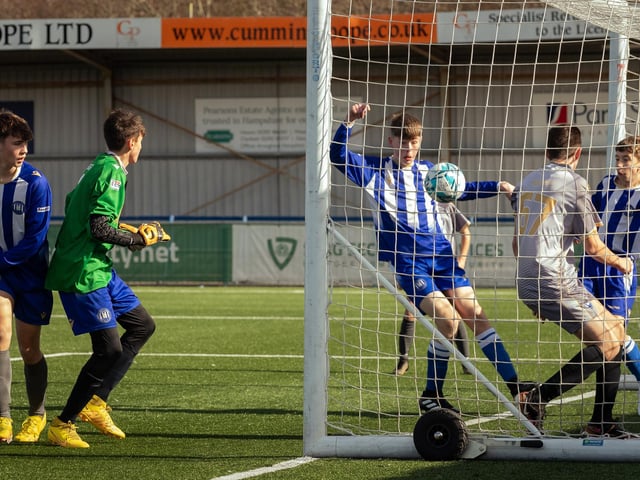 Action from the U15 Campbell McFaull Invitation Cup final between Hayling St Andrews Blue and Hayling St Andrew White. Picture: Keith Woodland (260221-42)