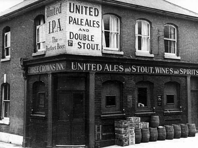 The Three Crowns Inn at Portsea, dressed for wartime service with blackouts in the windows.