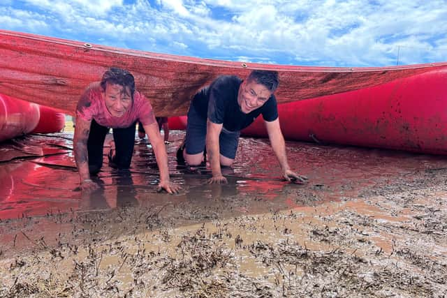 Tackling the cargo nets in Pretty Muddy