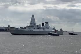 HMS Dauntless pictured returning to sea after 770 days at Cammell Laird shipyard in Birkenhead, near Liverpool.