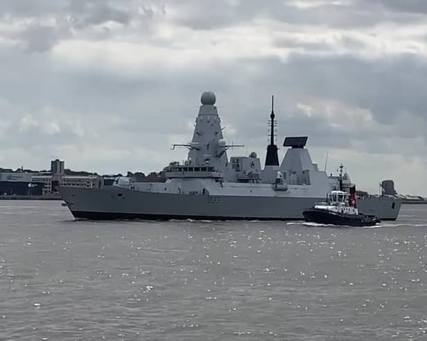 HMS Dauntless pictured returning to sea after 770 days at Cammell Laird shipyard in Birkenhead, near Liverpool.