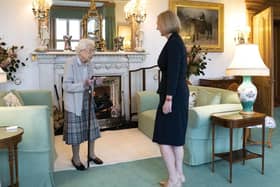 ABERDEEN, SCOTLAND - SEPTEMBER 06: Queen Elizabeth greets newly elected leader of the Conservative party Liz Truss as she arrives at Balmoral Castle for an audience where she will be invited to become Prime Minister and form a new government on September 6, 2022 in Aberdeen, Scotland. (Photo by Jane Barlow - WPA Pool/Getty Images)