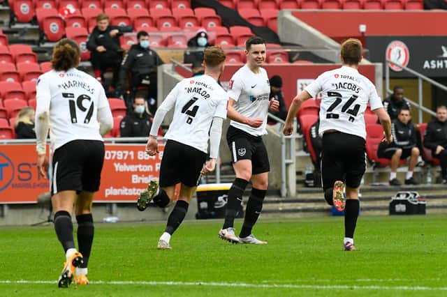 Callum Johnson accepts the congratulations of his team-mates after grabbing an equaliser against Bristol City on the stroke of half-time. Picture: Graham Hunt/ProSportsImages