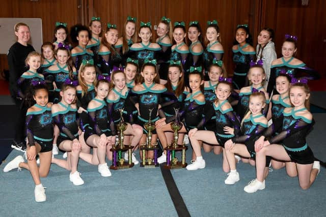 Students from Dance and Cheer-a-cality were encouraged by head coach Lara Hallam to take part in a toilet roll challenge video which showed off their skills to keep everyone smiling through lockdown. Pictured: Cheer-a-cality competition team 2020 aged between 7 and 21, with coach Lara and coach Demi