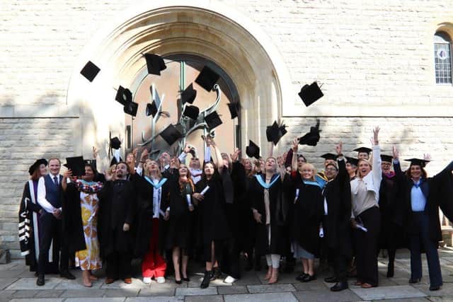 City of Portsmouth College graduates outside Portsmouth Cathedral