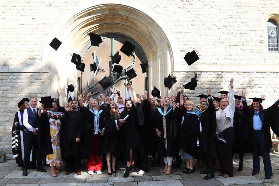 City of Portsmouth College graduates outside Portsmouth Cathedral