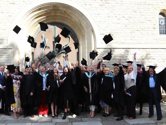 City of Portsmouth College graduates outside Portsmouth Cathedral