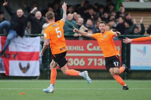 Dean Beckwith wheels away after his dramatic late winner at Dorking. Picture: Kieron Louloudis