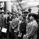 Jamaican immigrants welcomed by RAF officials from the Colonial Office. Picture: PA/PA Wire