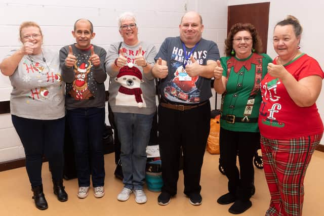 A charity Christmas bazaar took place on Sunday, November 24, at The Springwood Centre in Waterlooville.
Pictured is: Nina Holbird, Lance Harding, Nicky Parish, Darren Peat, Chris Westwood, Jannet Hickman.
Picture: Keith Woodland (241119-4)