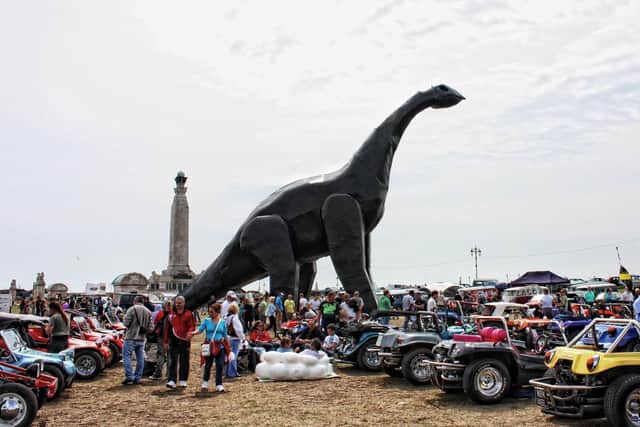 Southsea dinosaur Luna Park enjoying the annual VW Beach Dubbin'. Photo by John Daniels