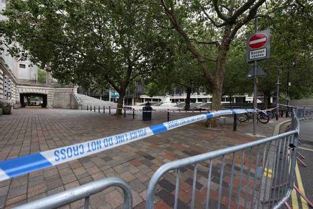 Police pictured searching the scene of a murder in the Guildhall area of Portsmouth, Hampshire, UK.

Saturday 29th July 2023.

Picture: Sam Stephenson.