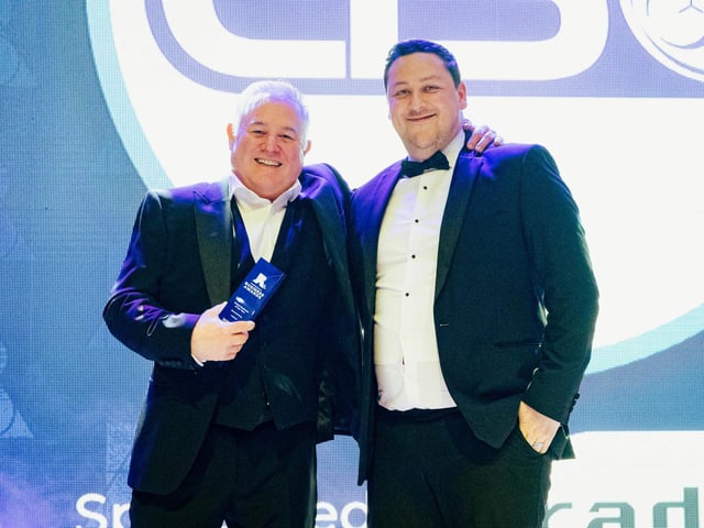 Steve Rad, of Radweb, presents Sean Codling of CTS Europe with the Global Business of the Year award.   Picture: Keith Woodland (270321-78)