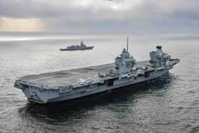 HMS Queen Elizabeth alongside HNoMS Otto Sverdrup during her Carrier Strike Group exercises off the coast of Norway. Picture: LPhot Belinda Alker.