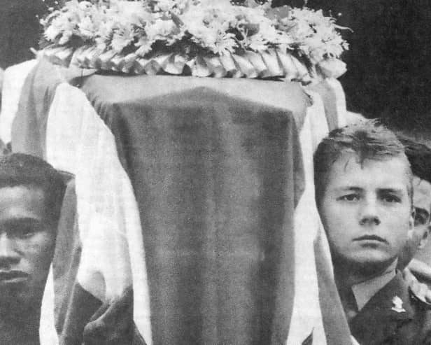Pallbearers from the Royal Artillery carry Stephen’s coffin in the crematorium.