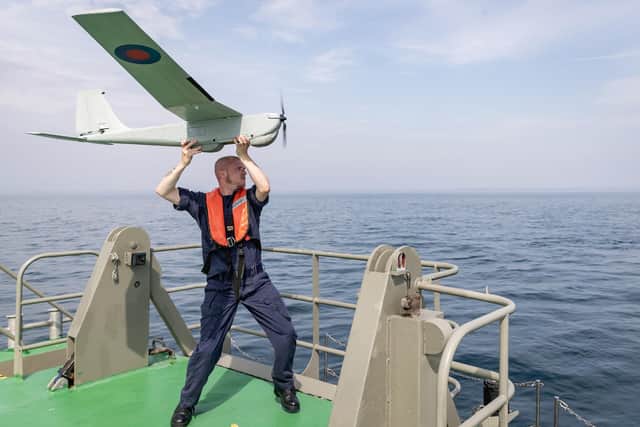 A specialist from 700X NAS deploying one of the new Royal Navy drones. Photo: Royal Navy