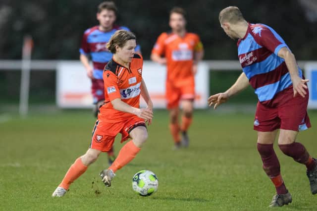 Oscar Johnston in action for Portchester against Hamworthy United last December. Picture: Keith Woodland