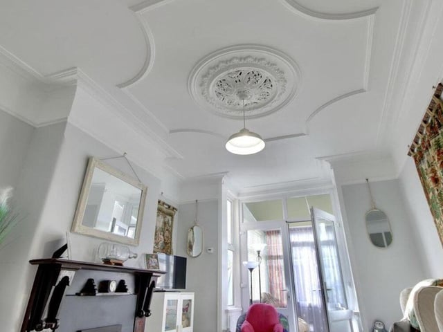 The listing says: "This property is modern, offers spacious rooms throughout and has beautiful original features making it the perfect family home. Downstairs you benefit from the dining room with bay, modern kitchen, shower room, lounge to the rear and the conservatory. Upstairs you have three good size double bedrooms, a study/cot room and the second shower room."