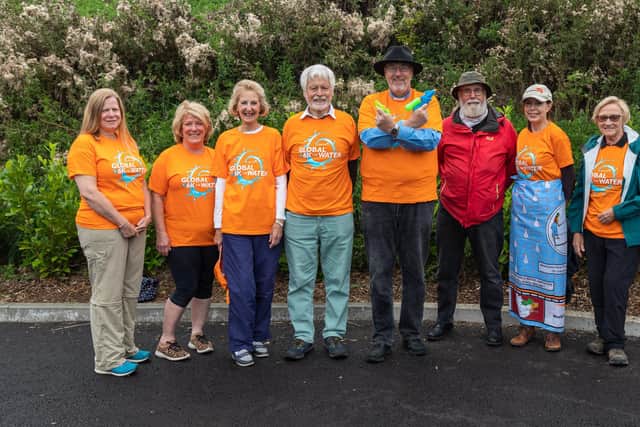 Walkers for the sponsored 6k Walk For Water. Pictured: Sarah Bond (51), World Vision Fundraising Coordinator Charlotte Tipping (61), Sue Tinney (75) and husband Sam Tinney (82),  Vicar of St Faithâ€™s Church Tom Kennar (55), Mike Birchmore (64) with wife Sue Birchmore (60) and Helen Crausaz (72). Picture: Mike Cooter (210821)