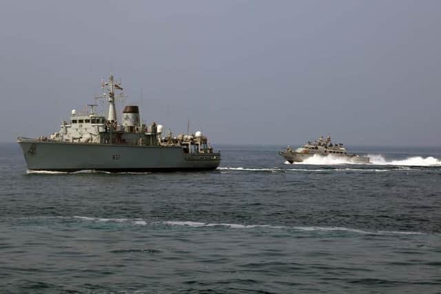 Portsmouth-based HMS Chiddingfold pictured being chased by US Navy Mark VI patrol boat as the American vessel tests how the British crew reacts under attack during a training drill in the Gulf. Photo: Royal Navy