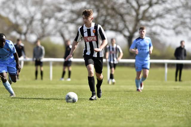 Lewis Askey on the ball for Hayling United against Portchester U23s. Picture: Allan Hutchings