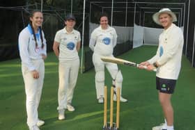 South African player/coach Matt Goles giving coaching tips to Burridge girls Emily Roberts, Katie Harris and Danni Candy