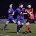 Callum Glen (second left) in action for US Portsmouth during their 3-1 FA Vase win against Bournemouth Poppies. Pic: Martyn White.