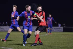 Callum Glen (second left) in action for US Portsmouth during their 3-1 FA Vase win against Bournemouth Poppies. Pic: Martyn White.