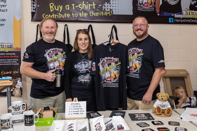 Smiffy (52), Laura Smith (35) and Alex Speight (53) from Hampshire Design Studios who produced merchandise for the event. 
Picture: Mike Cooter