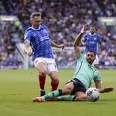 Gavin Whyte is fouled by Cheltenham midfielder Liam Sercombe at Fratton Park. Picture: Jason Brown/ProSportsImages