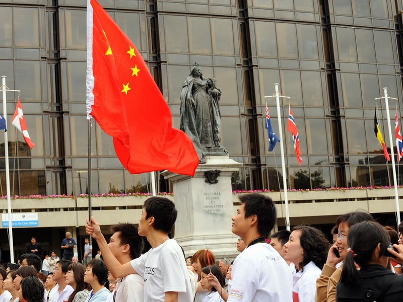 The statue of Queen Victoria has seen many sights in The Guildhall Square over the years including in 2008 when the Beijing Olympics were being shown on the new 'big screen'
PICTURE: MALCOLM WELLS (083324-552)