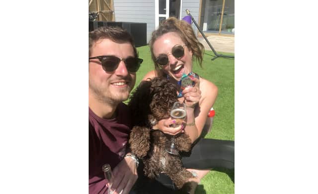 With the London Marathon postponed, Alice Jefferies ran 26.2 miles on her treadmill for the Stroke Association. Pictured with her boyfriend Ryan Blackburn and Colin the dog.