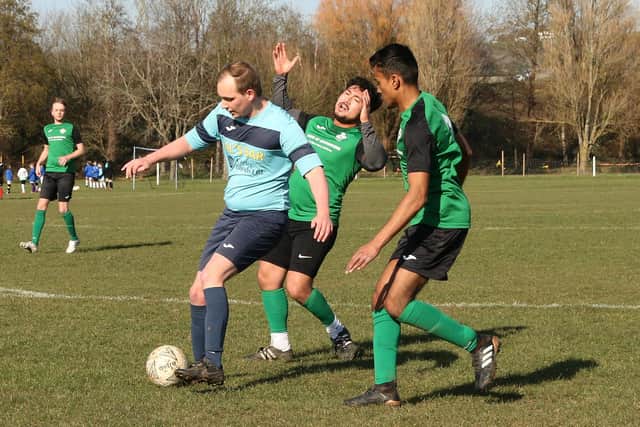 Al's Bar (light blue) v Saturn Royale. Picture: Kevin Shipp