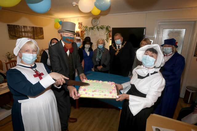 Staff cutting the cake on Home of Comfort's 125th anniversary.
Picture: Sam Stephenson