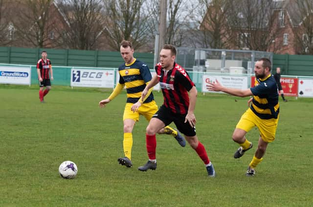 Fareham Town (red) will be playing on a Cams Alders pitch in 2020/21 which will have been improved via a four-figure grant from the emergency Pitch Preparation Fund. Picture: Duncan Shepherd