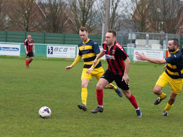 Fareham Town (red) will be playing on a Cams Alders pitch in 2020/21 which will have been improved via a four-figure grant from the emergency Pitch Preparation Fund. Picture: Duncan Shepherd