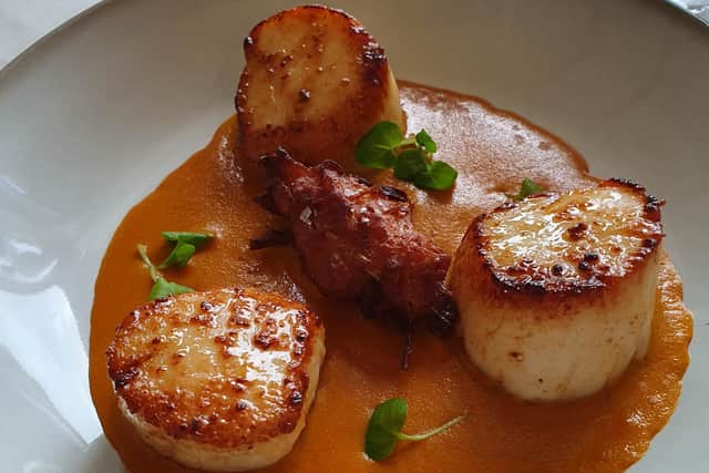 The scallops with masala sauce and bhaji... 'a winning combination' from the Restuarant 1865 seasonal menu at the Queens Hotel in Southsea. Picture: Mark Waldron