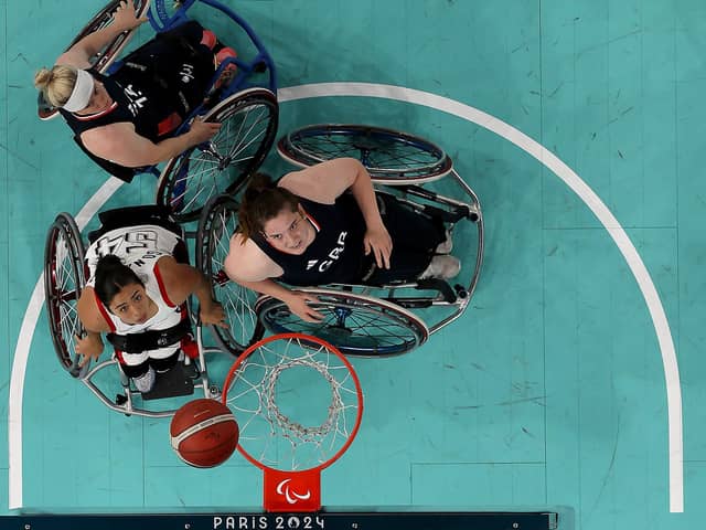 Jade Atkin, right, in action against the USA during the Wheelchair Basketball quarter-final at the Paris Paralympics. Picture: Steph Chambers/Getty Images