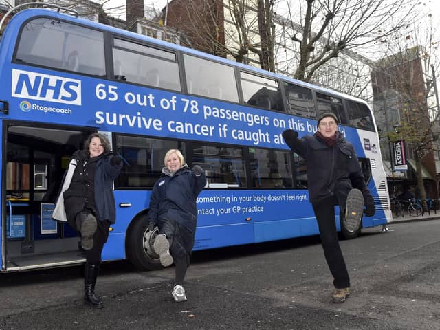 The NHS ’Bus-ting Cancer Tour’ in Guildhall Walk, Portsmouth on Friday, December 1, 2023, for the first time. 
Pictured is: (l-r) Danielle Robertson, Rachel Hibbert and Dr Richard Roope.
Picture: Sarah Standing (011223-2826)