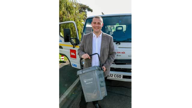 Cllr Dave Ashmore, Cabinet Member for Environment & Climate Change holding a 23L food caddy that will be used by an extra 10,000 homes as part of a trial. Picture: Portsmouth City Council