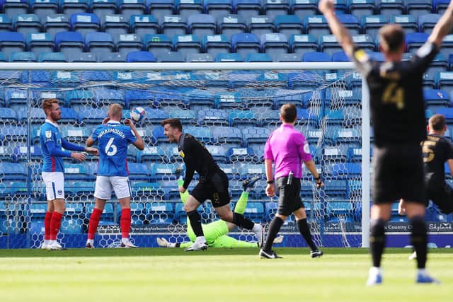 Lee Evans celebrates Wigan's opener against Pompey on Saturday. Picture: Joe Pepler