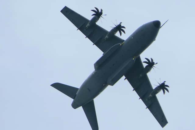 An RAF plane as spotted over Portsmouth and Gosport yesterday. The Ministry of Defence confirmed it was an RAF ATLAS A400 callsign COMET 458 aircraft. Picture: Alison Treacher.