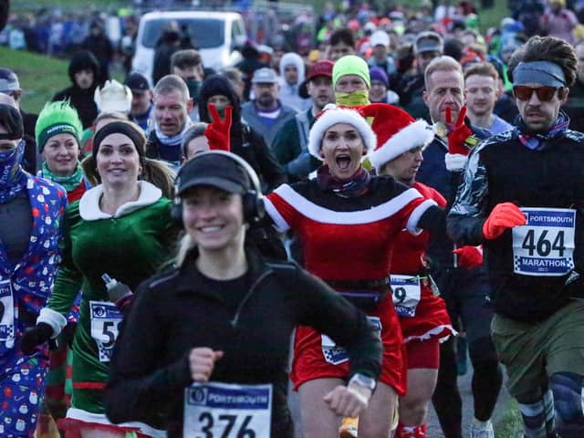 Runners donned festive attire for the Portsmouth Coastal Waterside Marathon. Picture: Chris  Moorhouse (221224-05)