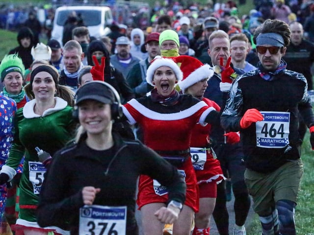 Runners donned festive attire for the Portsmouth Coastal Waterside Marathon. Picture: Chris Moorhouse (221224-05)