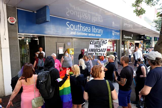 A Drag Queen hosting a children's story time at Southsea Library. Pictured are protests for and against it outside.

Picture: Sam Stephenson.