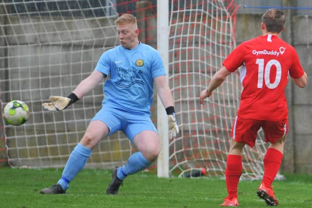 Zack Willett scores his 24th Wessex League goal of the season to put Horndean ahead against Bashley. Picture: Martyn White