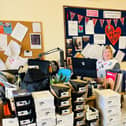 Jo Toms, chief operating offier of Home-Start Portsmouth, with some of the shoe donations. 