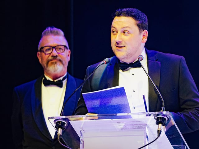 Steve Rad, of Radweb, reads out the winner of the Global business of the Year.  Picture: Keith Woodland (270321-69)